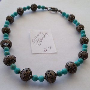 Silver floral balls and simulated turquoise beads a handcrafted necklace 18 inch